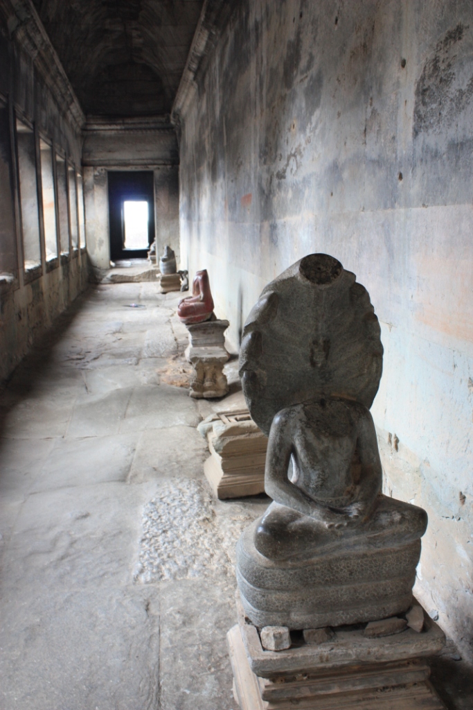 Between theft from the French, vandals, and the Khmer Rouge, most Angkor Wat Buddhas lack heads